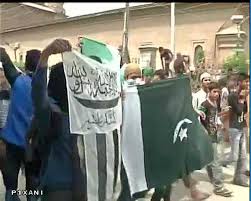 Youths wave Pakistani, IS flags; clashes with police
