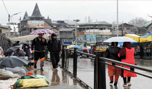 Mercury dips across Kashmir after fresh snowfall in hills, Heavy rains lash plains