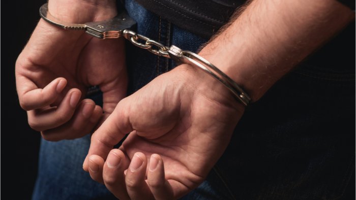 Former ministers son held after six years on rape charges
